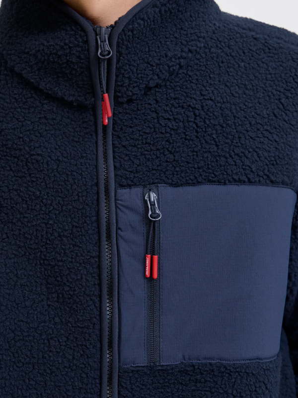 Tumman sininen fleecetakki